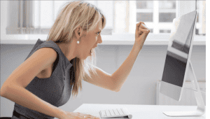 Woman angry at his computer
